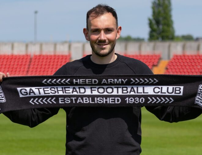 Sam Guthrie re-signs